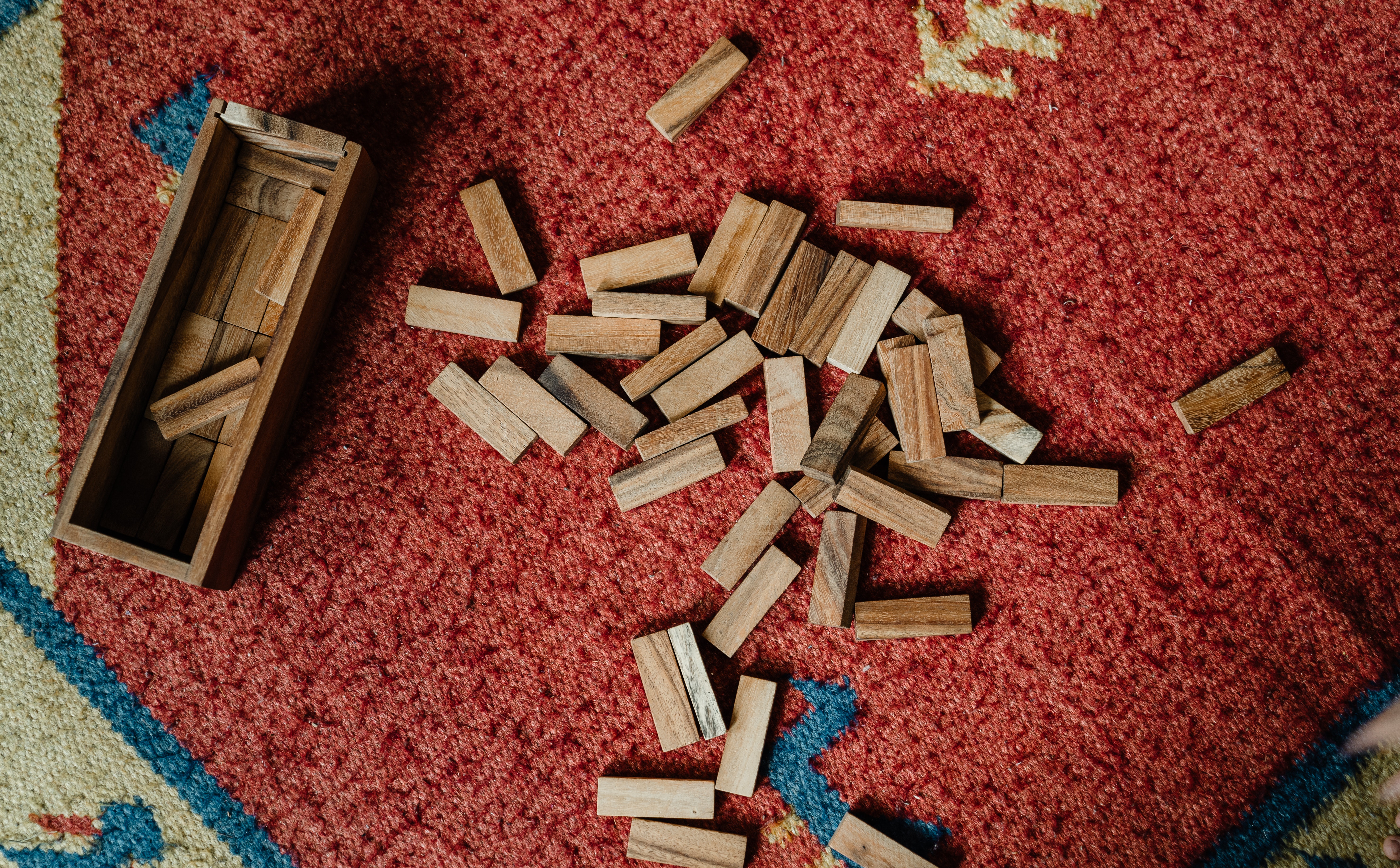 Scattered Jenga pieces on floor